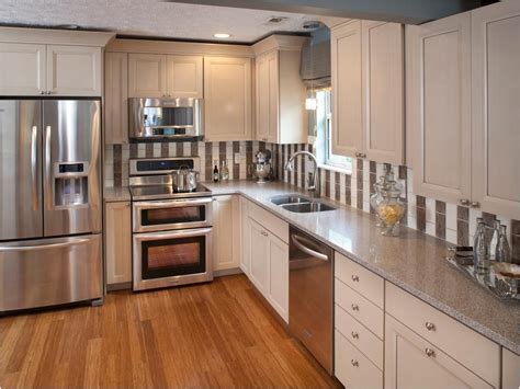 white kitchen cabinets with stainless steel appliances|mixing white and stainless appliances.